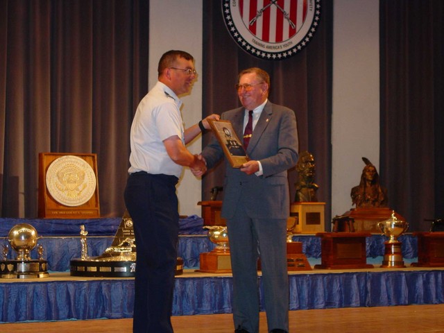 Maj Dave McCormick receiving the Spaatz Award from Mr. Bill Blankenshp