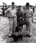 Col and Mrs. George H. Van Deusen, 1Lt Dennis D. Behrens, Van Deusen's dog