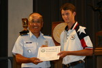 John Seward of TSRA Jrs receiving a Certificate of Achievement for his Second Place finish in the Junior President's Pistol Match (.22). See Team News for more information.