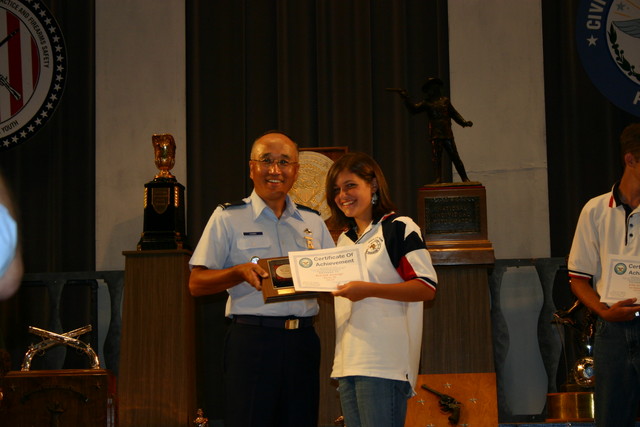 Col Chang presenting the Junior President's Pistol Match (.22) Award to Rebekah Jennings of TSRA Jrs. See Team News for more information.