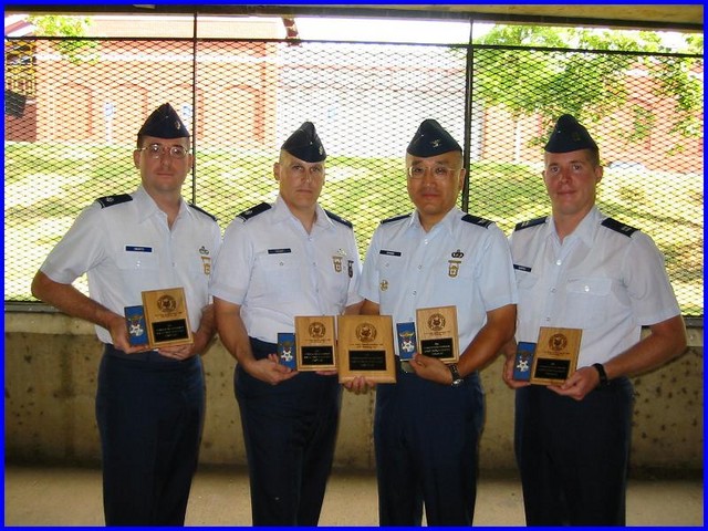 The 2002 USAF InterService Pistol Team with Bronze Award for Service Pistol Team Match
LtCol Stephen Swartz, Ph.D., LtCol Arthur Rozier, Col Joe Chang, Capt Adam Curtis