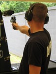 SSgt Sergey Aguryanov with his Wadcutter .45
