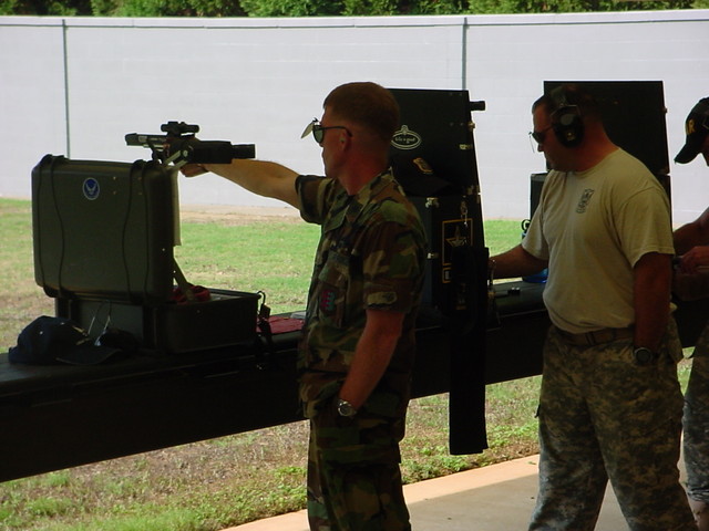 Col(s) Teskey firing a Pardini .22