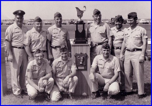 The 1966 USAF Pistol Team with Gold Cup Trophy
MSgt Donald L. Snapp, SSgt Arnold Vitarbo, SSgt Alfred G. Richards, TSgt Bernard A. Stoltman, Capt Franklin C. Green (OIC), Alc Calvin E. McCloud, MSgt William B. Byers (NCOIC), MSgt Donald R. Rupp, Capt Gustave R. Banks.  To see their bios, go here, and click on a face.