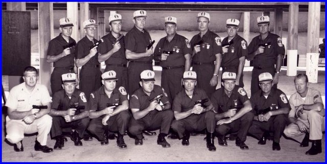 The 1969 USAF Pistol Team
MSgt Donald Rupp, MSgt William Byers, SSgt Leslie Foster, TSgt Robert Meagher, MSgt Donald Snapp, TSgt John Ditmore, SSgt Hubert Legg, SSgt Robert Dueitt, Capt Larry Hadley, SSgt Alfred Richards, SSgt Bobby Tiner, SSgt Arnold Vitarbo, SSgt Edwin Teague, SSgt Dwight Thyarks, Capt Franklin Green, SSgt David Breeding (Gunsmith).  To choose their bios, go here, and click on a face.