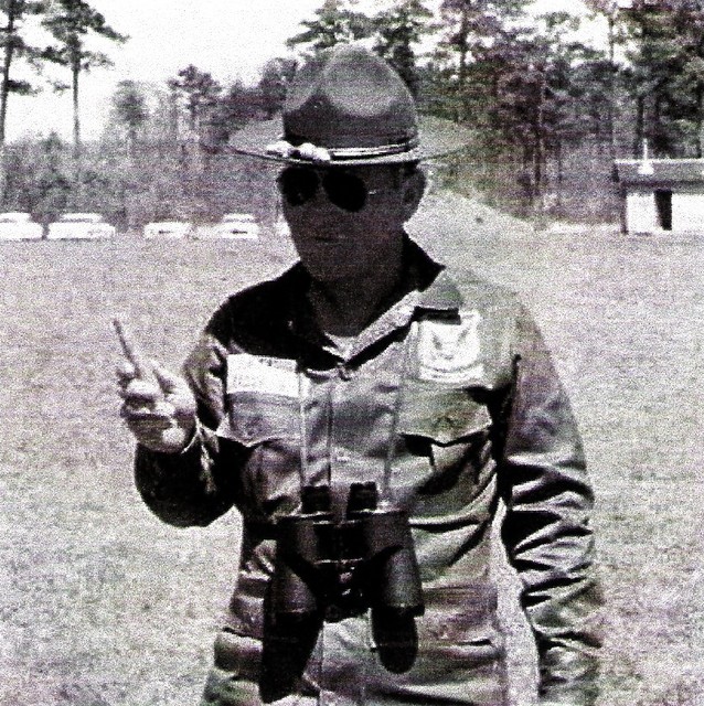 Maj Bassham, Army Rifle Team OIC, eating carrots