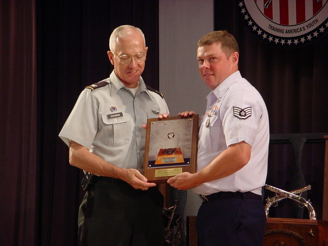 TSgt(s) Slater receiving his General Curtis LeMay Award