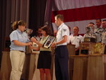 TSgt(s) Aguryanov receiving his Collegiate Awards from the Port Clinton Mayor