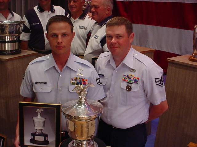 TSgts(s) Aguryanov and Slater with the General Twining Award and Trophy