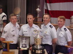 TSgt(s) Kallan Slater, TSgt(s) Sergey Aguryanov, LtCol David McCormick and Col Mark Teskey with TSgt(s) Aguryanov's General Twining Award and Trophy