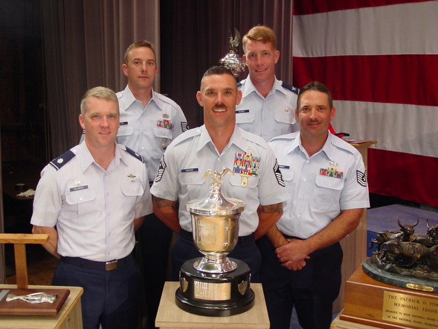 LtCol Thomas Reardon, TSgt Brendan McGloin, SMSgt Daniel Bouchee, Col Mark Teskey and Msgt(s) Paul Noblit with SMSgt Bouchee's General Twining Trophy