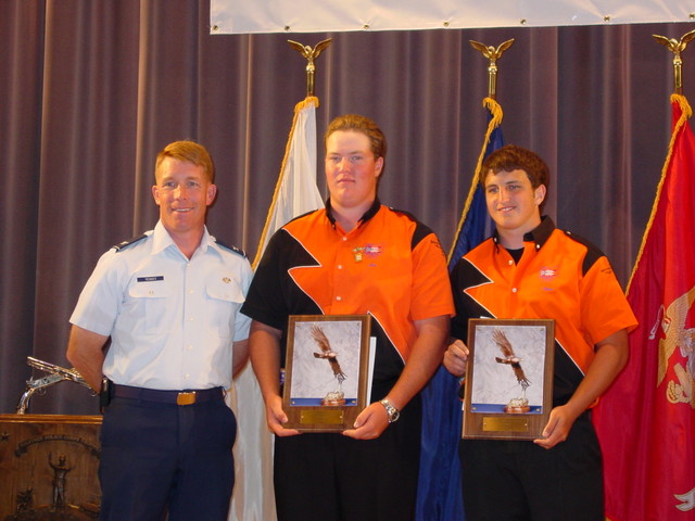 Joseph Totts and Ryan Nichols receiving their National Junior Team Trophy Winner Awards from Col Teskey