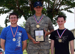 Amn Callage with his Gold Medal and Hagstrom Trophy Award for Junior Air Pistol